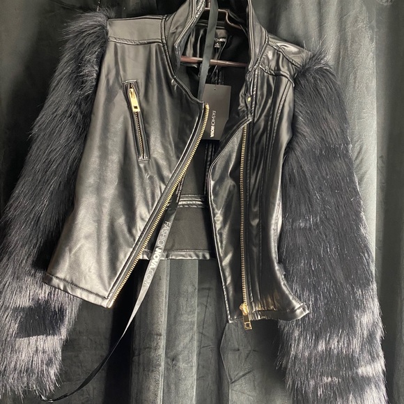 Faux leather coat with faux fur sleeves. - Picture 1 of 6